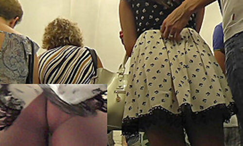 Babe in polka-dot skirt walks with guy in upskirt clip