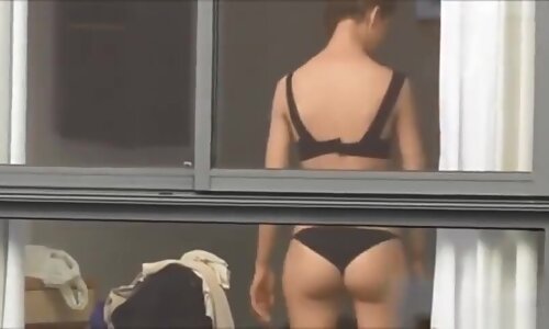 Spying on neighbour undressing.