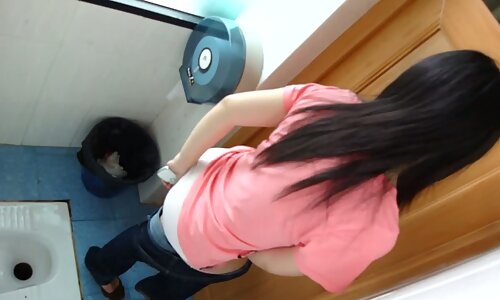A cute Asian chick really needs to pee.