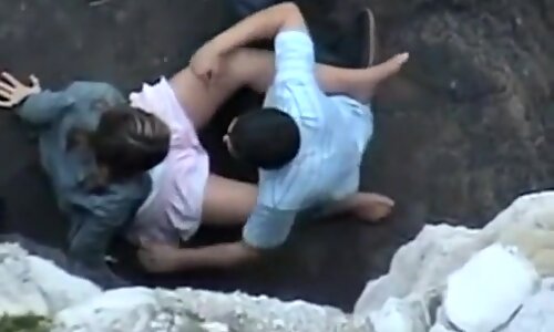 Lovers on Rocky Beach