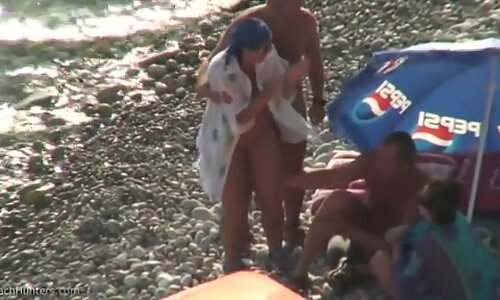 Real swingers at a nudist beach