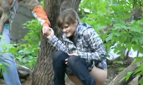 Nasty brunette babe peeing in public in front of